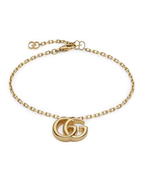 Gucci running g gold bracelet